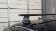 2012 Subaru Legacy Sedan with Thule 480R Traverse AeroBlade Roof Rack by Rack Outfitters
