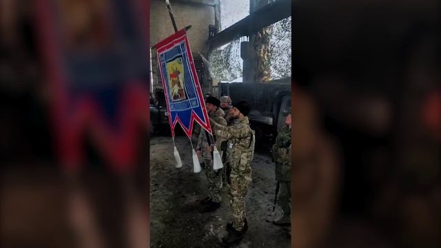 Церемонии торжественного вручения освященных знамени и боевой хоругви казачьему батальону "Ермак"
