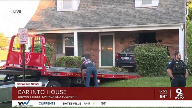 Officials: Driver taken to the hospital after crashing into house