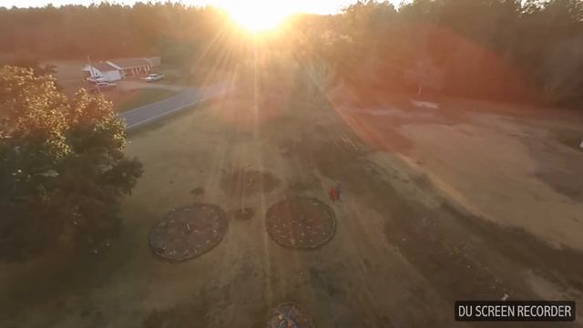 Xiro xplorer mini GPS flying around the Yard and follow me and circle me modes in heavy wind and it