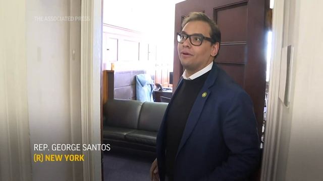 Rep. George Santos gives out doughnuts amid calls to resign