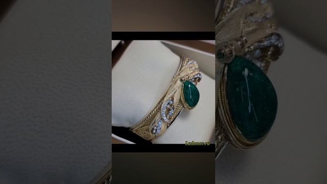 Золотой браслет с изумрудом. осьминог.
