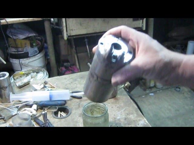 Чистка водяного шпинделя от накипи.