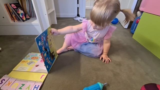 Ema Reads an Alphabet Book