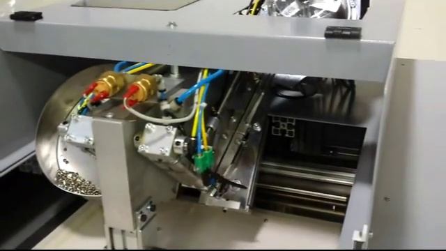 SAGITTA MR25 CN A 2H CNC Machine to apply Plastic / ABS STUDS fixed with NAIL