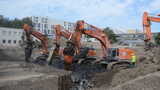 Big foundation demolition with big Hitachi excavators from  AWR Abbruch
