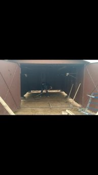 Подсыпка песка в гараже и трамбовка