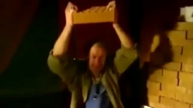 Женька сказал разбить кирпич о голову
