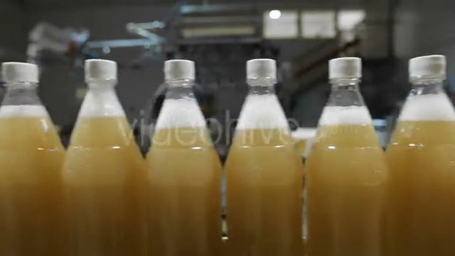 Lemonade In Plastic Bottles On The Conveyor - Stock Footage | VideoHive 16528671