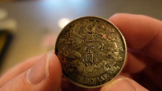 Lets take a look at a Chinese Xuantong Dragon Dollar