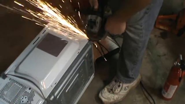 Fat Guy Attempts Microwave Repair