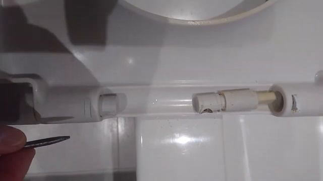 removing cover strips to dampners / cylinders / hinges villroy boch soft close toilet seat.