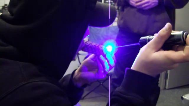 1.2w 445nm laser smokes some dude.