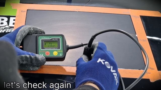 How much micron is removed by SANDING ?
