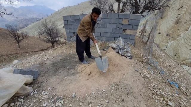 Sacrifice: A kind man completes the wall of a lonely mother's house in snowy weather.