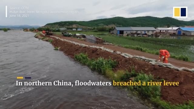 Firefighters rescue people from flooded homes in China as heavy rainfall swells  rivers