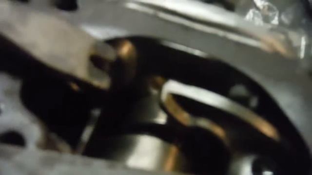 Checking valve spring fitted length on Honda 350 race engine.
