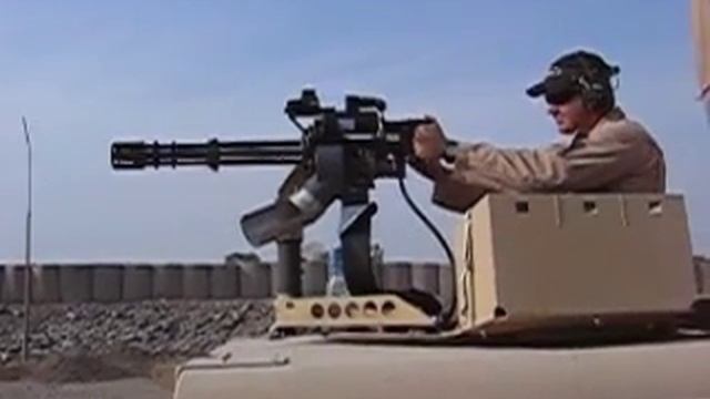 Firing the M134 Dillon Aero Minigun from an M1114 HMMWV