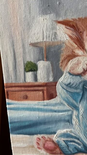 Картина маслом с котенком в кровати