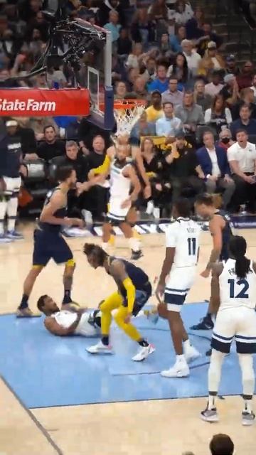 This angle of Ja Morant's thunderous poster over Malik Beasley 🤯 (via @lexirossmedia/IG)