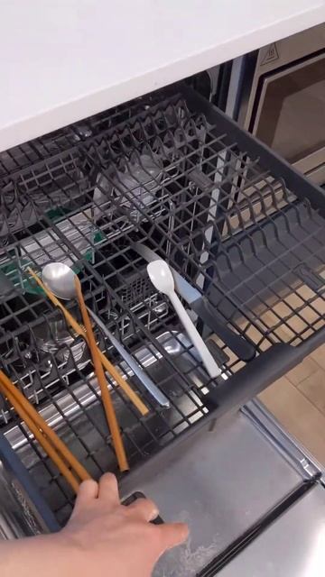 Dishwasher top utensil slider hard to slide in and out