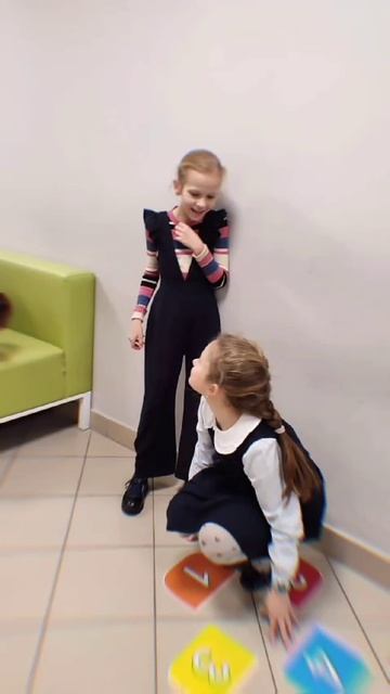 В школе.