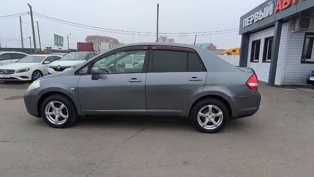 Nissan  	Tiida	2006	серебристый	SC11072893
