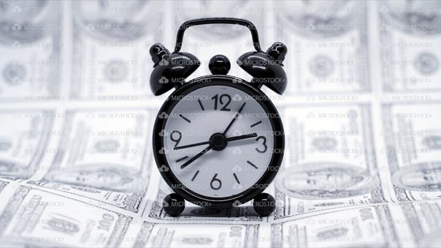 Business finance and money concept. Save money for prepare in the future. Clock passing with dollar