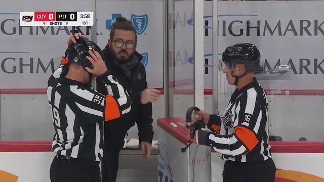 Penguins’ Alex Nedeljkovic Stretches Out To Rob Flames’ Rasmus Andersson