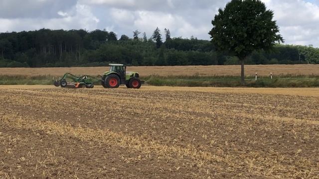 Claas Atles 936 tractor with Amazone Catros on barley stubble