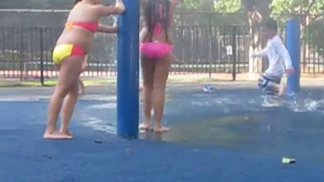 Rhea and Rita playing in the sprinkler at the park July 23rd 2015