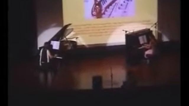 Vanessa Wee & Luo Ling Yan.--Grieg's piano concerto in A minor