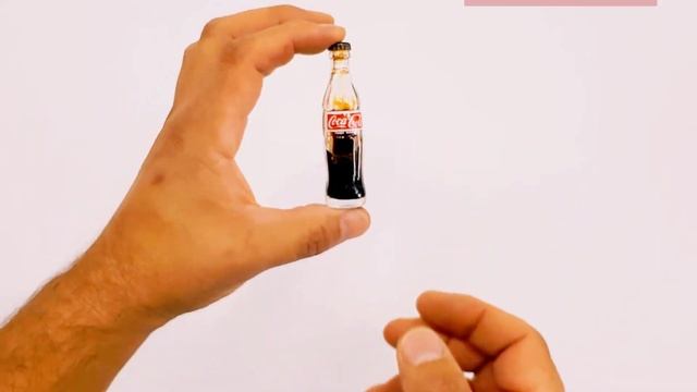 Recuerdo de los 80' mini botella de coca cola. Quizas la tuviste!
