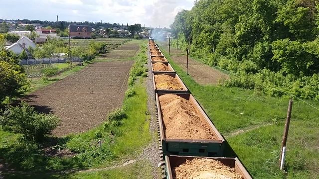 2М62У-0247 с грузовым поездом