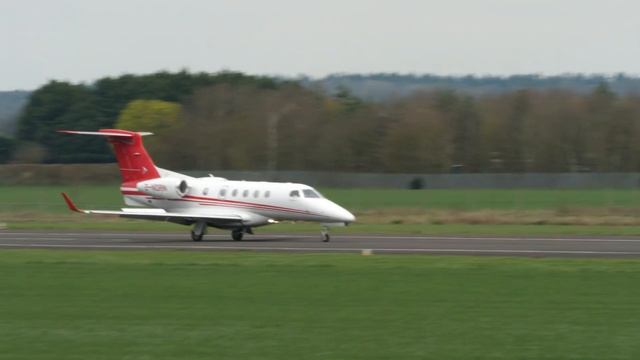 Embraer Phenom 300 landing Wellesbourne Mountford Airfield