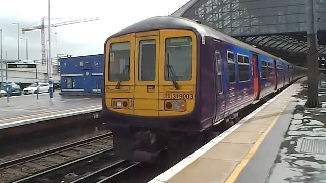 377 arrives and 319 departs Brighton