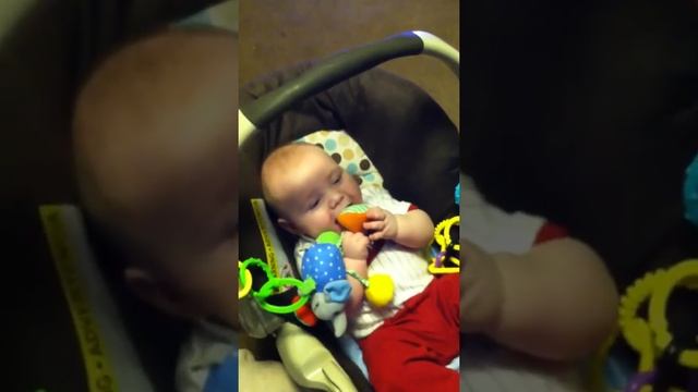 Bentley laughing at his bottle