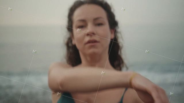 Portrait of a young woman, she dances, moves expressively.