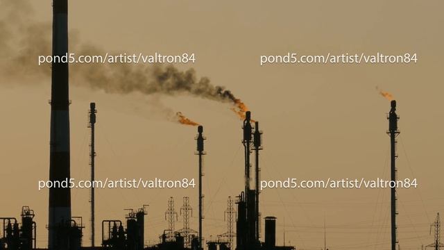 burning torches at the plant for processing of oil and gas