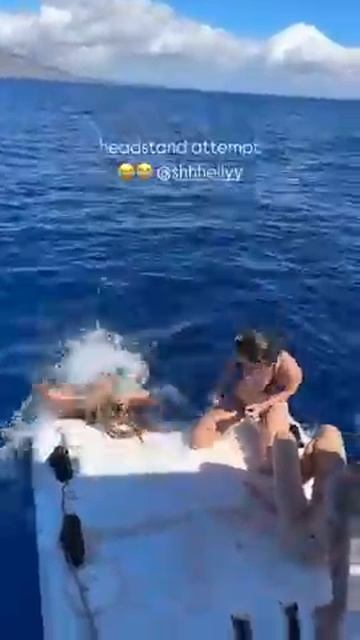 Упала в море