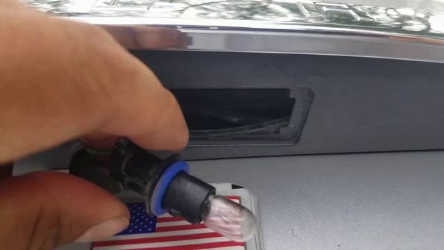 license plate light bulb right side replacement on 2018 Chevy Impala