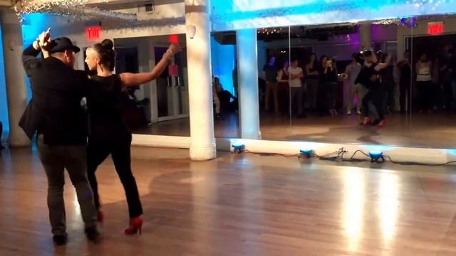 Marta Khanna and Garry Portugal teaching partner work on 2 in Candela NY