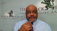 How does the Black Business School compare to Harvard and other top universities?