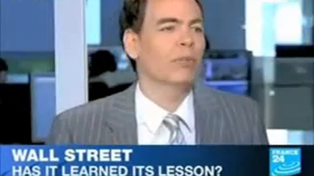 Max Keiser Slams Goldman Sachs   Paulson and Bernanke Guilty of  Treason Part 1of of 2