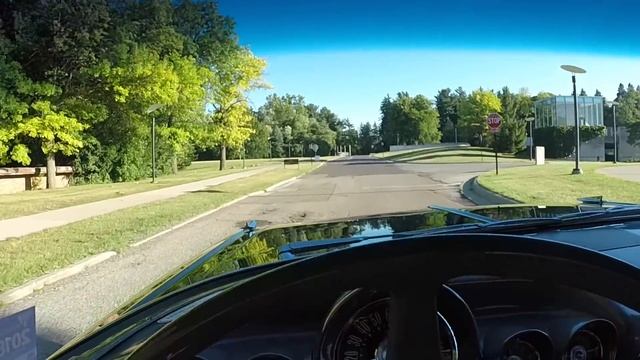 Checking out future car projects and cruising Woodward in 59 Bel Air