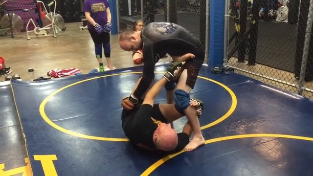 MMA & Jiu Jitsu in Austin, Texas - Knee Bar from the Guard, Preventing the Crossface