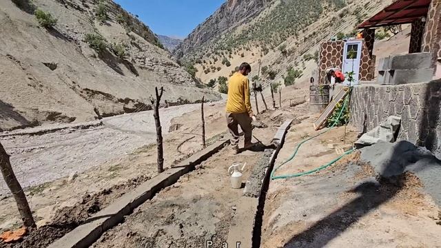 Life in the village.  Babak, the father of the family, is building a vegetable garden  #rurallife