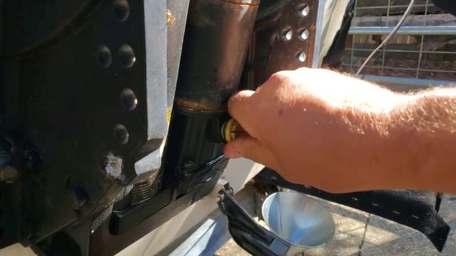 Outboard boat motor tilt & trim problems fixed by filling with fluid and bleeding the system