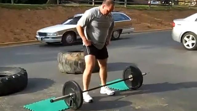 Mike Krivka, Sr. Practicing the One-hand Oly Snatch with 95