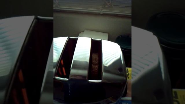 Vintage Fully Automatic Sunbeam Toaster in Action